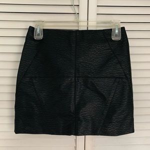 High-waisted mini leather skirt